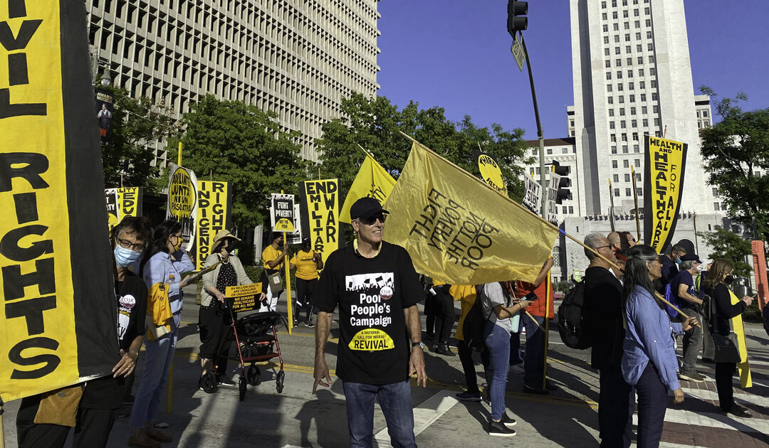 Episcopalians join rally advocating for rights and support for the poor